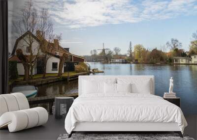 River Vecht with a windmill in the background in the village of Loenen aan de Vecht. Wall mural