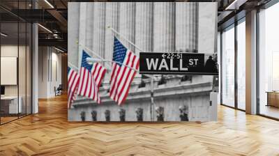 Wall street sign with focus on sign, blurred American flag background Wall mural