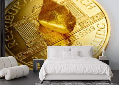 golden austrian philharmoniker one ounce coin laying on a heap of golden nuggets, golden ore Wall mural