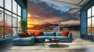 view of Bratislava castle during golden hour with beautiful sunset on river Danube, Slovakia Wall mural