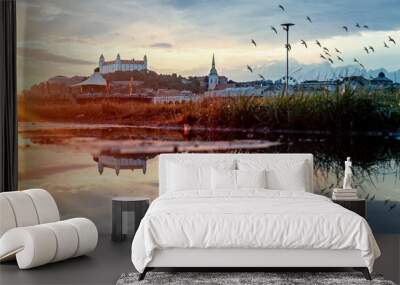 view of Bratislava castle on late afternoon in water pool with the ricochet and beautiful sunset on river Danube, Slovakia Wall mural