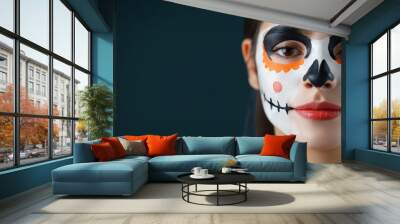 Day of the Dead calavera face paint on woman  on black background with copy space for text Wall mural