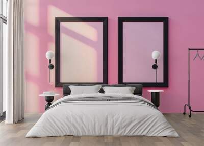 Two black picture frames on pink background Wall mural