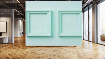 Two mint green picture frames on green background Wall mural