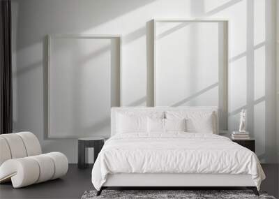 Two white picture frames on white background Wall mural