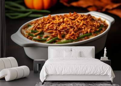 Thanksgiving green bean casserole with crispy onions on dark black table Wall mural