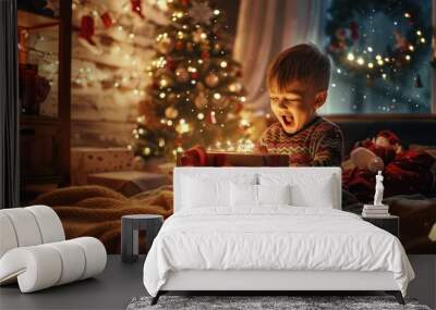 Photo of a cozy bedroom with children in their pajamas excitedly opening presents on Christmas morning. Wall mural