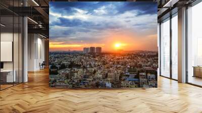 Sunset in Bangalore City India with blue, orange and yellow clouds Wall mural