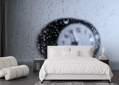 Clock and splashing water drops. Wall mural