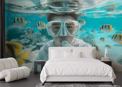 Underwater photography of tourist with  mask . Wall mural