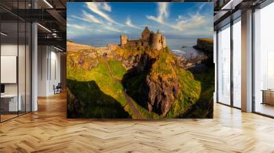 Dunluce Castle is a medieval castle in Bushmills Northern Ireland - big panorama Wall mural