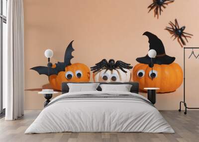 decoration for halloween party - cute pumpkin heads with eyes and good faces. witch hat, flying bat  Wall mural