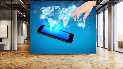 Hand holding Modern communication technology mobile phone show t Wall mural