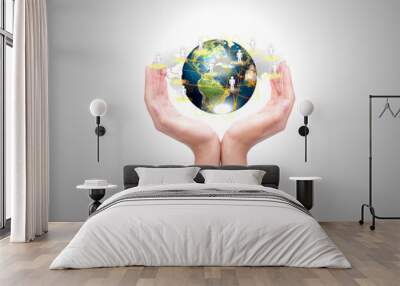 Two woman hands hold earth of social network (Elements of this i Wall mural