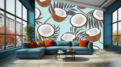 Seamless pattern coconut piece and palm leaves on blue background, Vector illustration Wall mural