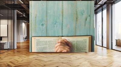 Hands woman pray on open bible,prayer and worship in the morning with copy space. Wall mural