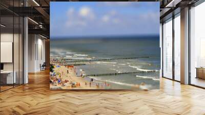 Beach at sea in summer with holiday makers Wall mural