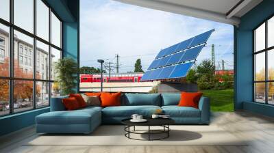 solar panels at a train station in Berlin germany, to prevent climate change Wall mural