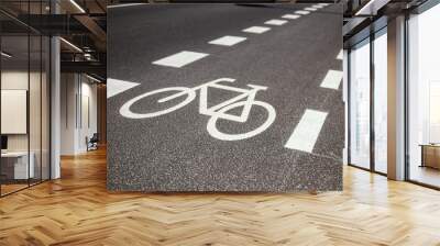 white bicycle sign on a bike lane Wall mural