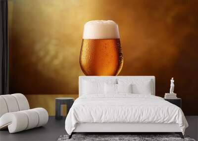 Golden beer in a glass on reflective surface Wall mural