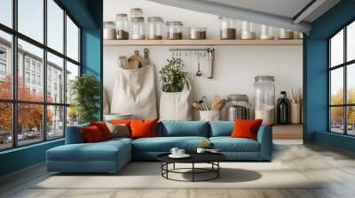 A kitchen shelf with jars and bags of food. The jars are mostly clear and the bags are white. Wall mural