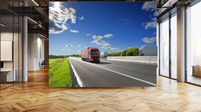 Large Transportation Truck on a highway road through the countryside at sunset Wall mural