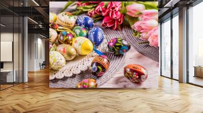 Multicolored spring tulips and Easter eggs with decorations Wall mural