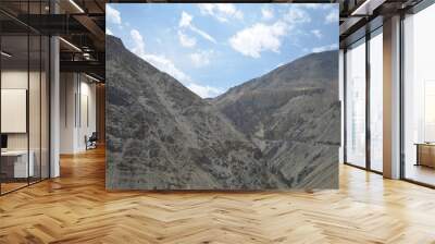 the view of Himalaya mountains on a sunny day under the blue sky in the morning or the evening in Tibet India China the road on high altitudes Wall mural