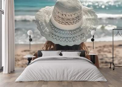 Girl in a white hat on the background of the beach, sun, sea and sand Wall mural