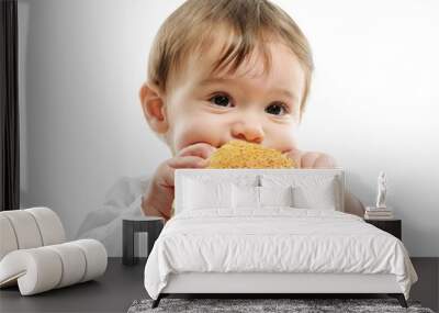 Baby eating bun bread Wall mural