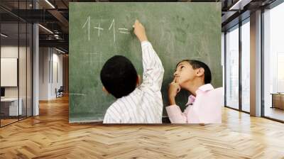 two boys in classroom thinking, writing Wall mural