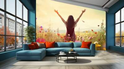  Happy carefree woman standing in the wildflower meadow with opened arms, back view

 Wall mural