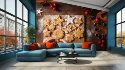 Close up of a woman hands making Christmas gingerbread cookies Wall mural