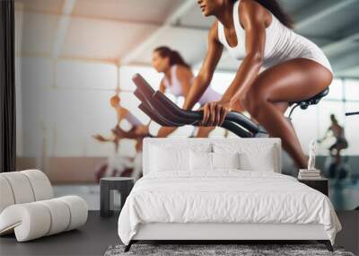 Group fitness class , featuring participants engaged in an energetic workout, such as spinning, aerobics, set against a bright, gym studio background Wall mural