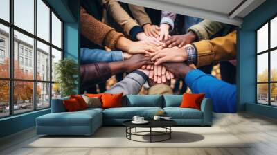 Group of mix race people joining hands together in a circle supporting each other, symbolizing unity and collective action in the fight against social injustice Wall mural