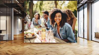 Group of young and happy people having lunch at the beautifully decorated table with healthy food in the garden, AI generative art Wall mural