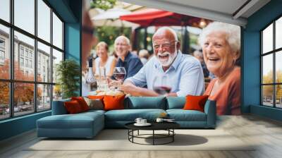 Happy group of senior mix race people having lunch in Amsterdam street restaurant . Life style concept with friends having fun together on summer holiday Wall mural