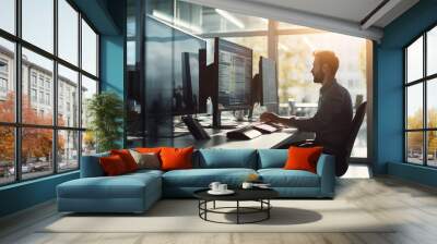 Man at computer, software developer working on coding script or cyber security in bright modern office Wall mural