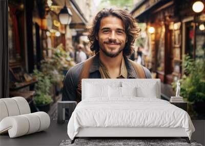 Portrait of a attractive smiling man standing on the city street  Wall mural