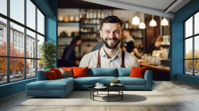 Portrait of a happy and smiling waiter, or small business owner in the coffee shop.  Wall mural