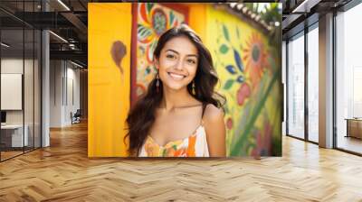 Portrait of a happy smiling Hispanic woman outdoors Wall mural