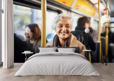 Smiling mature senior woman riding the bus in Vienna Wall mural