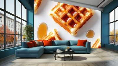 Waffles with maple syrup on a white background Wall mural