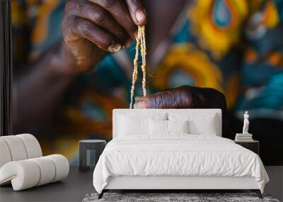 Close-up of Hands holding a single string for making jewelry Wall mural