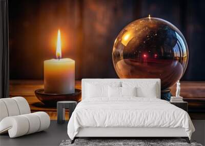 burning wax candle and fortune telling crystal ball in mysterious room Wall mural