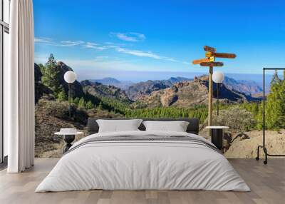 Directional signs along the Roque Nublo hiking trail Wall mural