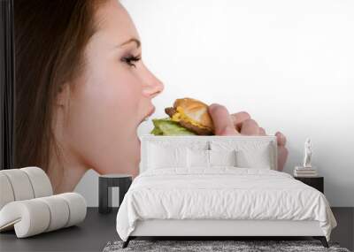 woman eating hamburger Wall mural