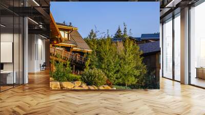 Two cabins in luxury neighborhood at sunset pano Wall mural