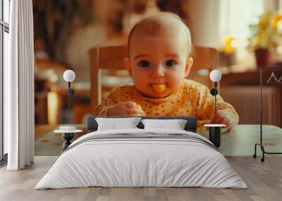 Happy infant baby eats itself Wall mural