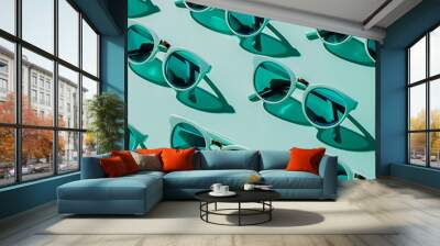 a bunch of turquoise sunglasses that are in a row Wall mural